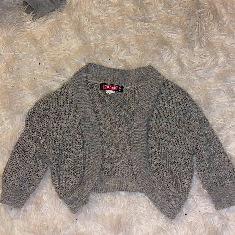 cropped, grey sweater/cardigan